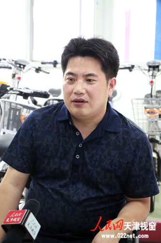 采訪天津市美麗行鋰電車科技有限公司總經(jīng)理張亞軍。